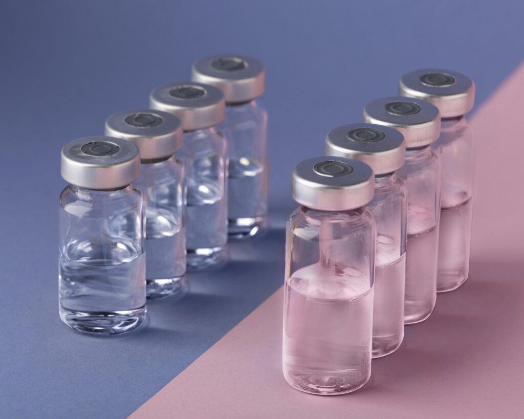 Row of vials prepared for CJC-1295 no DAC research and BPC-157 research studies.