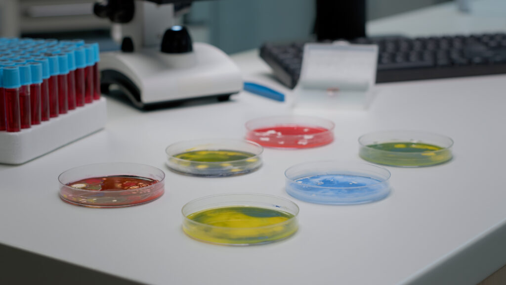 Spectrophotometric absorbance measurement in a laboratory, representing the cofactor-dependent enzyme assays used in NAD+ salvage pathway research.
