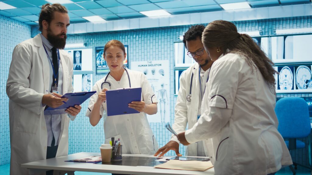 Research team reviewing clinical study data, representing the phase 3 trial evidence evaluated in the depot-selective compound literature.